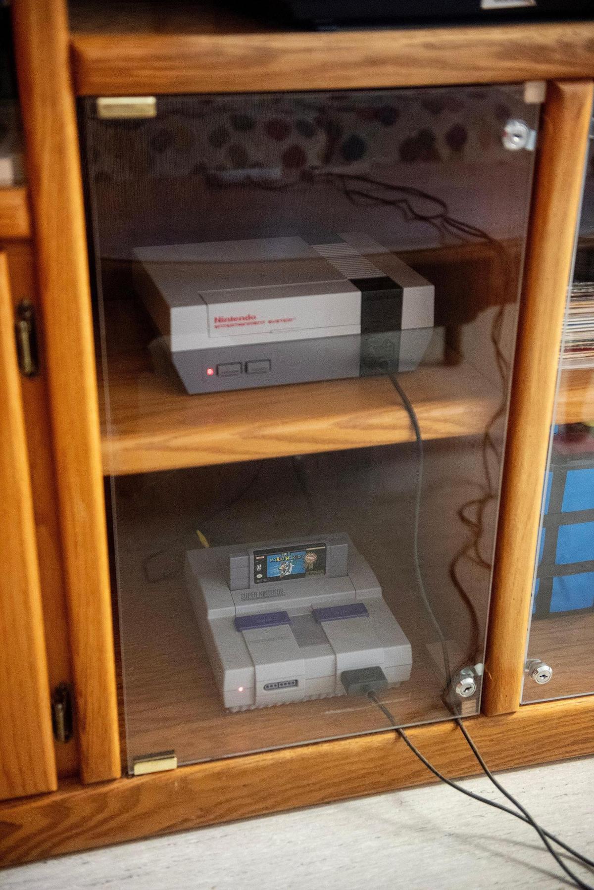 A 1980s and 1990s experience exhibit featuring VHS tapes and video game consoles at Kids Discovery Station located at 350 W. Yosemite Ave. in Merced, Calif., on Wednesday, March 12, 2025.