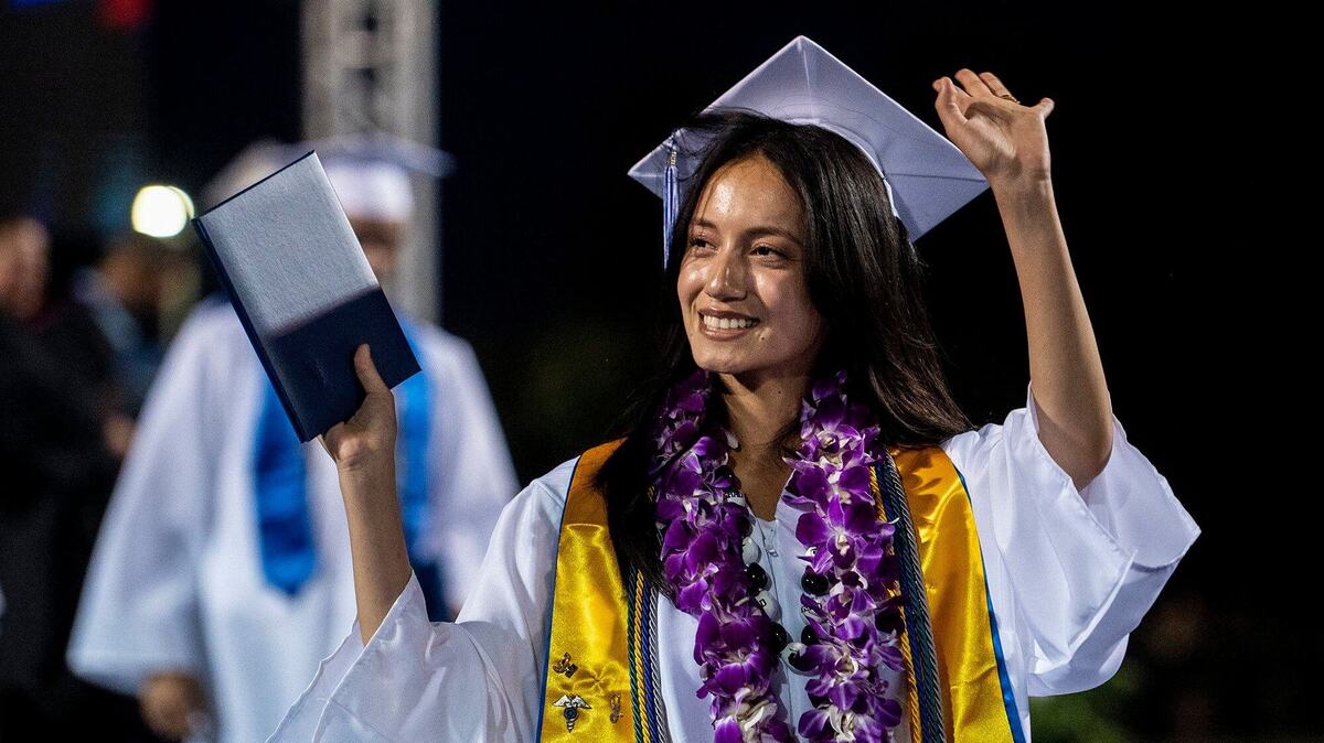 Graduates celebrate after receiving their diplomas during the Atwater High School class of 2024 commencement ceremony at Atwater High School in Atwater, Calif., on Thursday, June 6, 2024.