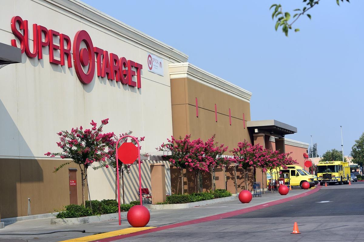 An Atwater fire engine and cleanup crews were parked outside of the Super Target in Atwater on Wednesday, Aug. 8, 2018, the day after someone set a fire inside the store. The store was closed to customers on Wednesday.