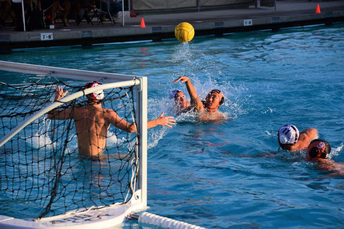 Merced High senior David Chen lofts a shot against Johansen during the Bears’ 19-8 win in the first round of the Sac-Joaquin Section Division II playoffs at Golden Valley High.