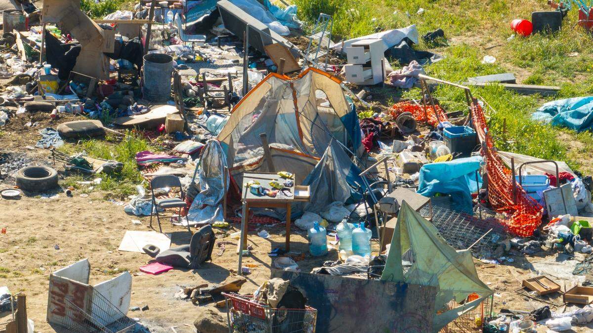 Merced County officials partnered with other local agencies to tear down a large homeless encampment located near East Childs Ave. and Highway 99 this week in Merced.