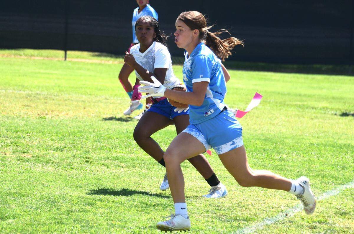 El Capitan High receiver Mady Dietz runs after making a catch during a game against Tokay on Saturdday, Aug. 27, 2024 at Merced High School.