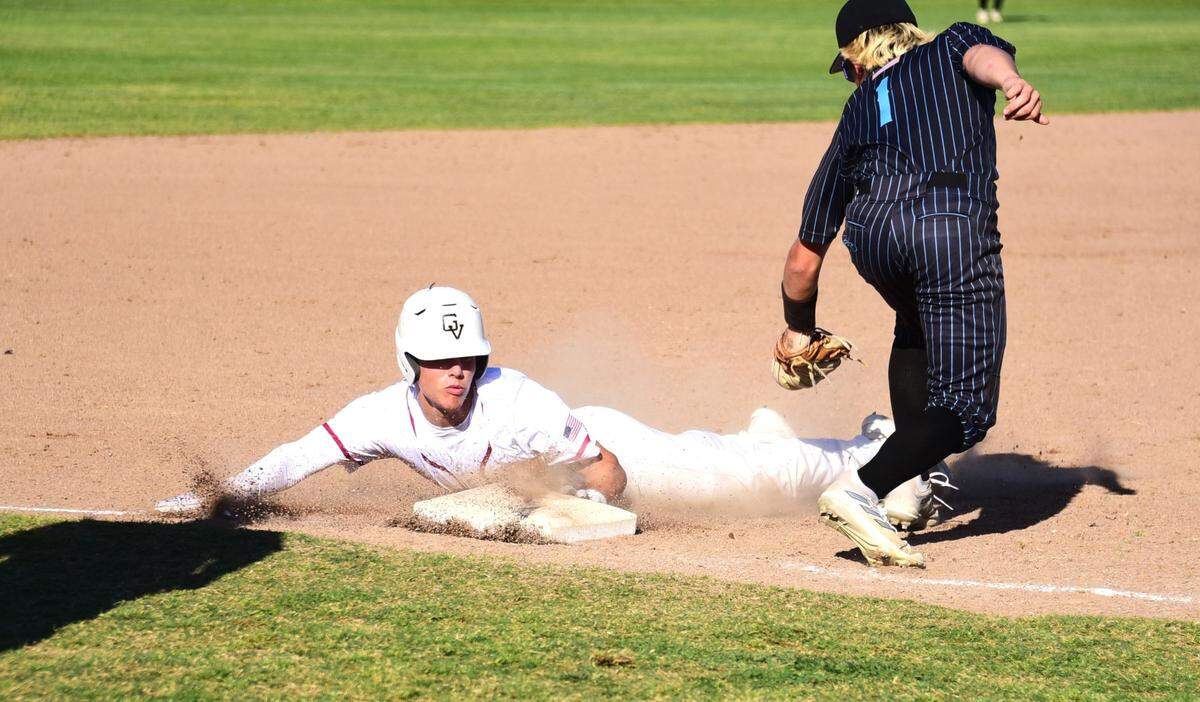 Golden Valley High senior Koen Heupel (6) steals third base during a game against El Capitan on Tuesday, March 26, 2024 for his 12th stolen base this season.