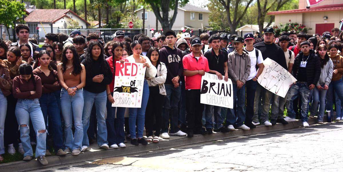 Gustine High School students show their support for senior Brian Ortiz Nunez during a special graduation ceremony in his honor on Friday, April 12, 2024 at Gustine High School in Gustine, Calif.