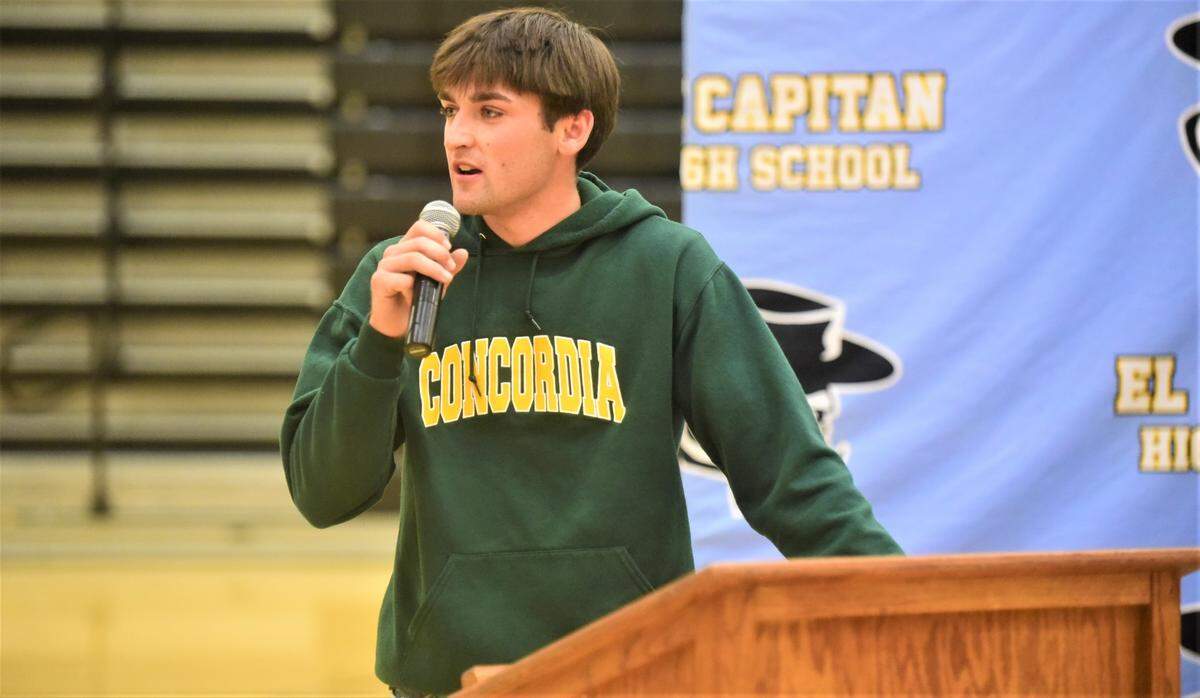 El Capitan High School senior Brody Collins speaks to the crowd during his national letter of intent signing ceremony on Friday, April, 21, 2023. Collins accepted a basketball scholarship to Concordia University in Irvine.