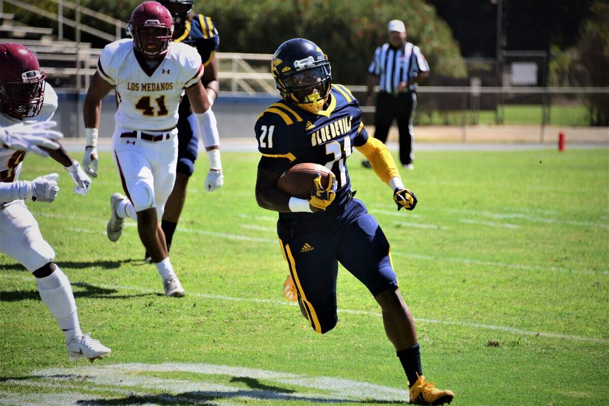 Merced College running back Jaedon Galicinao runs the ball during a game against Los Medanos on Saturday, Sept. 11, 2021 at Don Odishoo Field in Merced, Calif.