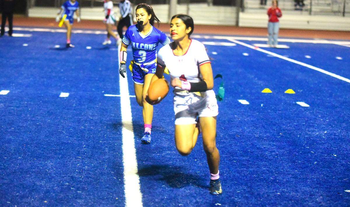 Ceres High School senior quarterback Marrisa Renteria runs in a touchdown during a 34-0 playoff win over Atwater on Thursday, Oct. 26, 2023.