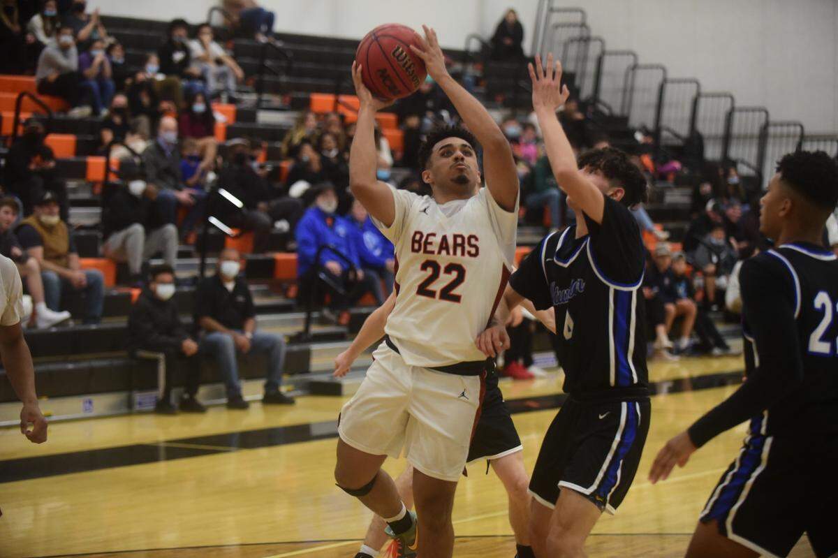 Merced High senior Seth Mays-Meneley goes up for a shot against Atwater during the Bears’ 63-45 win over the Falcons on Wednesday, Feb. 2, 2022 at Merced High School.