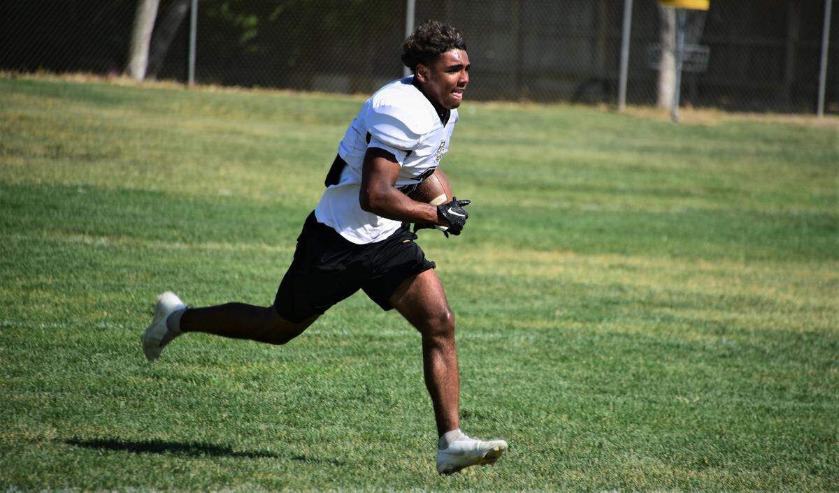 Buhach Colony High School senior Jaxson Percoats returns a punt during practice on Tuesday, Aug. 16, 2022.