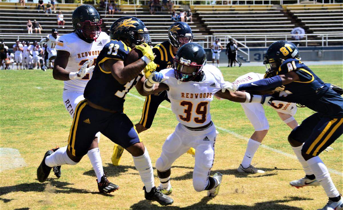 Merced College running back Malachy Harts runs the ball against College of the Redwoods on Saturday, Sept. 3, 2022.