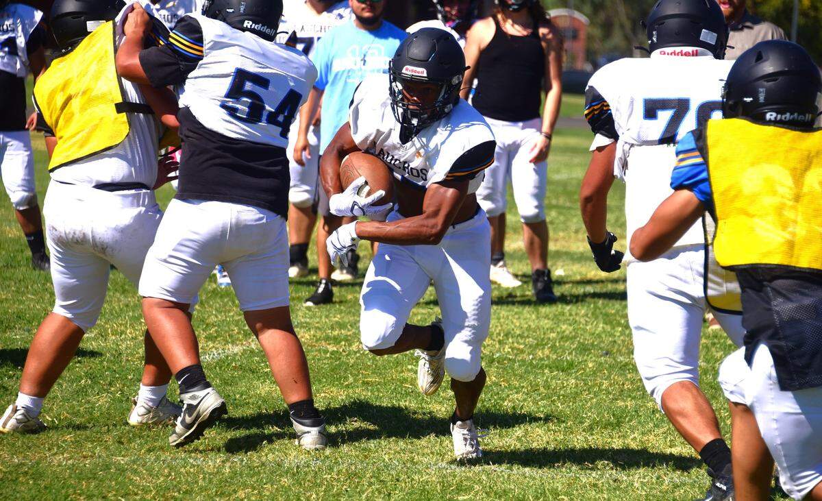 El Capitan High running back Dejuan Franklin carries the ball during during practice on Tuesday, Aug. 20, 2024.
