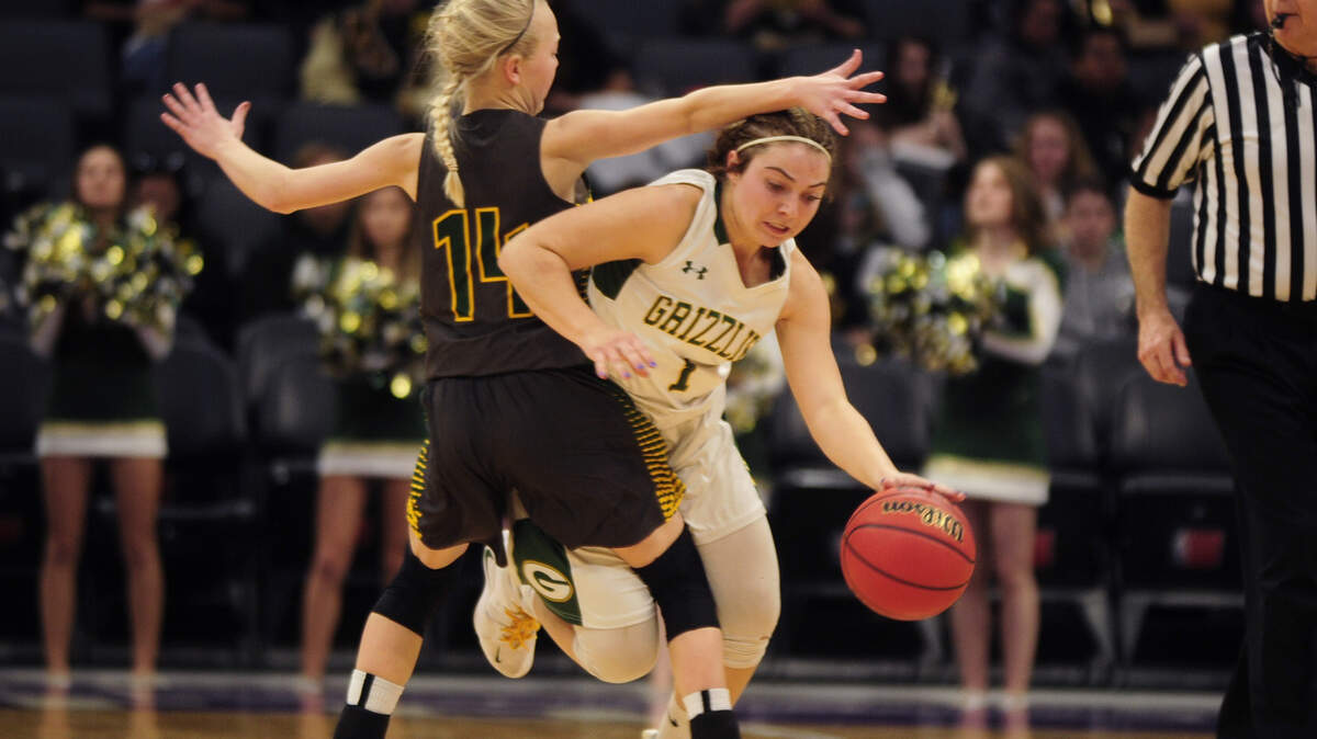 Taylor Vegeley (1) is blocked by an Argonaut defender, during the Mariposa High vs Argonaut Sac-Joaquin Section Division V Championship at Golden 1 Center in Sacramento, on February 23, 2019. Despite a fourth quarter effort to comeback, the Mariposa Grizzlies lost to Argonaut.