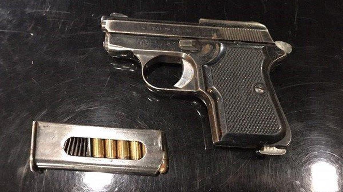 Merced Police said an alleged gang member has been arrested after officers found a gun and ammunition in a car he was driving. Photo courtesy of the Merced Police Department.