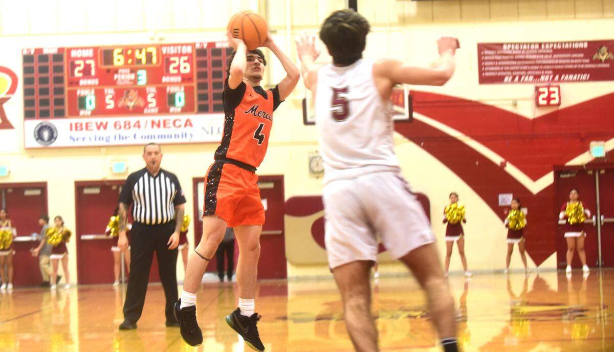 Merced High School sophomore guard Keaton Hillyer (4) goes up for a shot during a game against Golden Valley on Wednesday, Jan. 3, 2023 at Cougar Arena.