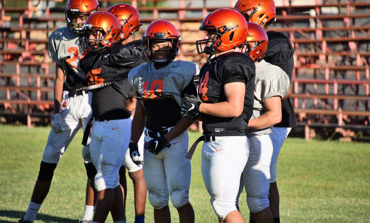 Merced High senior Desmond Thompson (10) returns after rushing for 1,000 yards last year for the Bears.