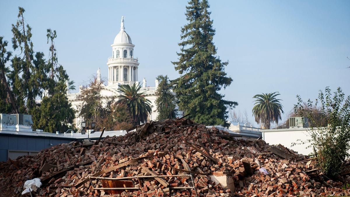 A historic 19th century building and the first Merced County building constructed as a high school, is now a pile of rubble, located at 2125 M Street in Merced, Calif., on Thursday, Dec. 5, 2024. Both city and county firefighters responded to the blaze which broke out inside the structure Monday morning.