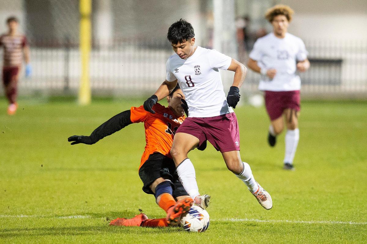 _ during a game against _ at Merced High School in Merced, Calif., on Thursday, Jan. 11, 2024. The Cougars beat the Bears 3-1.