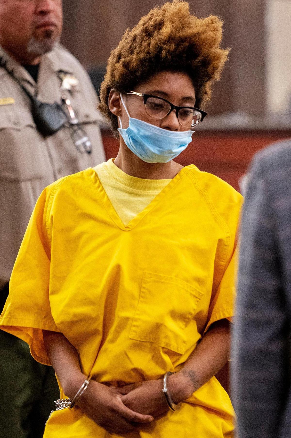Samantha Johnson, 30, walks out of the courtroom after appearing before Judge Ronald Hansen at the Merced County Superior Courthouse in Merced, Calif., on Monday, March 28, 2022. Johnson faces felony murder and child abuse charges after her 8-year-old daughter Sophia Mason, was found dead inside a Merced home on March 11.