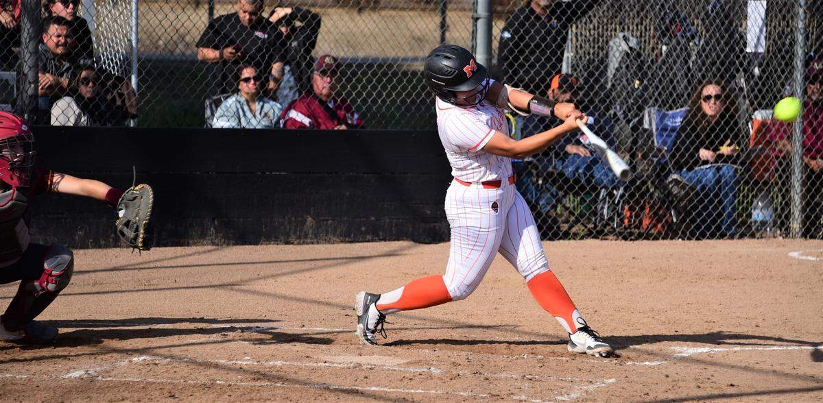 Merced High senior Ellie Alvarez lines a single during a 4-3 win over Golden Valley on Thursday, March 31, 2022 at Merced High School.