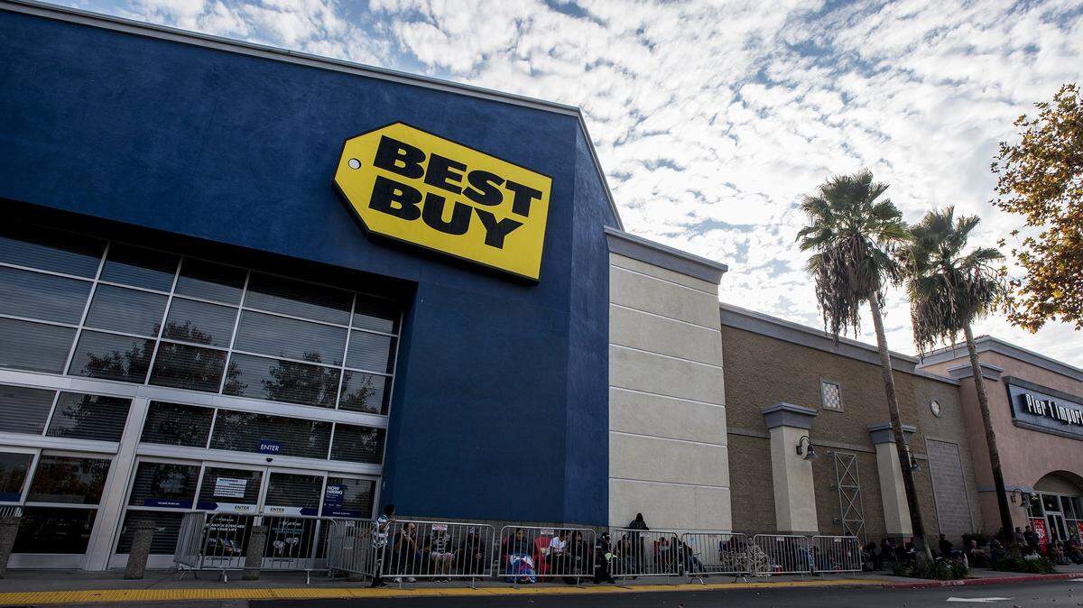 People wait in line outside Best Buy located at 1764 W. Olive Ave. in Merced, Calif., on Thursday, Nov. 23, 2017. A spokesperson for the store announced that the Best Buy store in Merced will be closing in March. The company hopes to open a new store in Merced by the end of 2020.