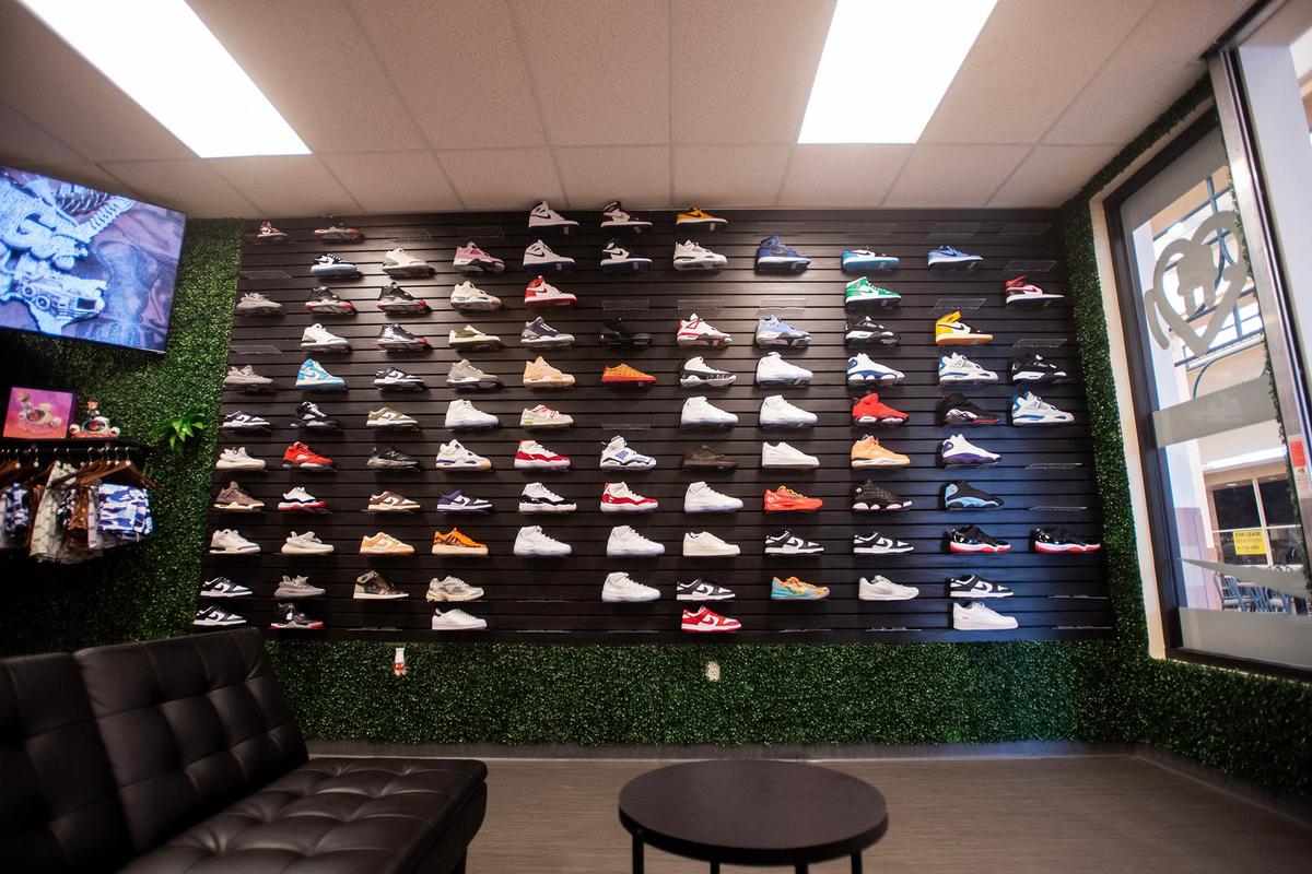 Sneakers for sale are displayed on the wall inside The Come Up Kickz located inside the Marketplace at Merced in Merced, Calif., on Friday, May 16, 2025. The business sells, buys and trades merchandise such as sneakers, collectibles, designer items and clothing.