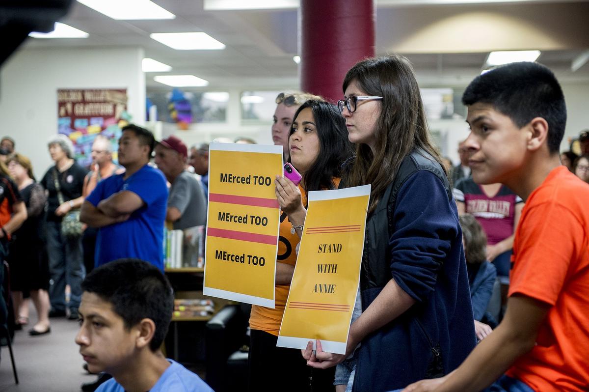 Supporters of Golden Valley teacher Annie Delgado look on during a public comment session of the Merced Union High School District meeting at Golden Valley High School in Merced, Calif., on Wednesday, May 9, 2018. Delgado spoke before school board members alleging the school district mishandled a report she made to the deputy superintendent after she experienced sexual harassment and battery by a colleague in 2017.