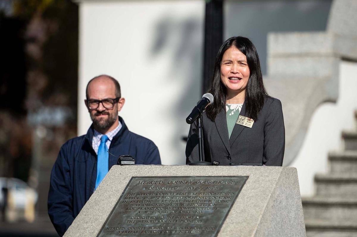 Merced County Courthouse Museum Director Sarah Lim speaks during a ceremony to celebrate the start of a project to restore the exterior of the historic Merced County Courthouse Museum in Merced, Calif., on Wednesday, Dec. 11, 2024. More than $3 million in funding was secured for the restoration process which will help to maintain the building’s structural integrity and long-term sustainability. County officials said a time capsule containing various items will be buried on the property upon completion of the restoration project.