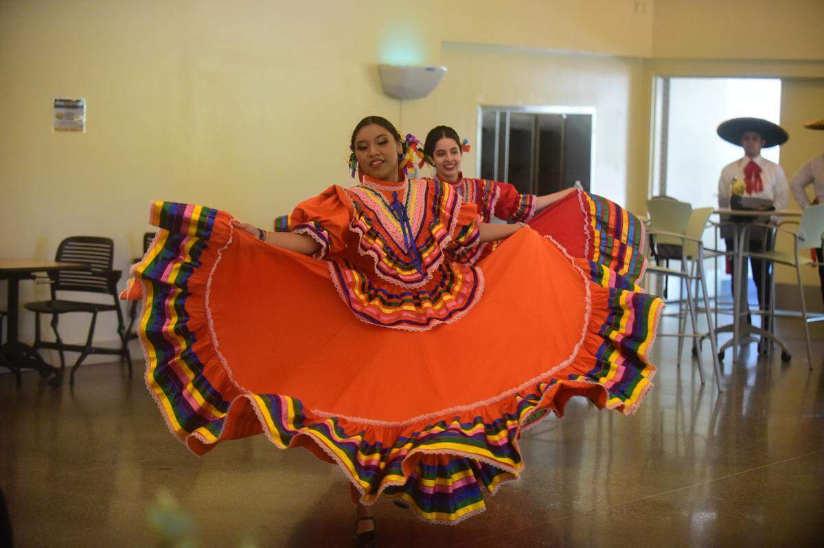 Dancers from the group Ballet Folklorico de UC Merced performed during a ceremony recognizing UC Merced undocumented students who are graduating this weekend on Friday, May 13, 2022 at UC Merced in Merced, Calif.