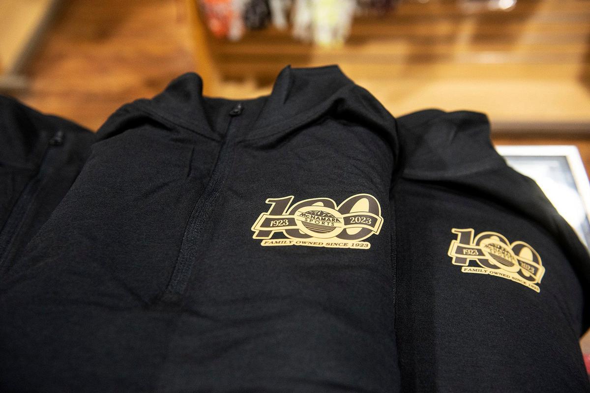 A 100 year anniversary logo is added to shirts at McNamara Sports, located at 437 W. 18th Street in Merced, Calif., on Monday, May 8, 2023. The family owned store which sells athletic equipment, team uniforms, business apparel and offers screen printing and embroidery services, is celebrating 100 years in business