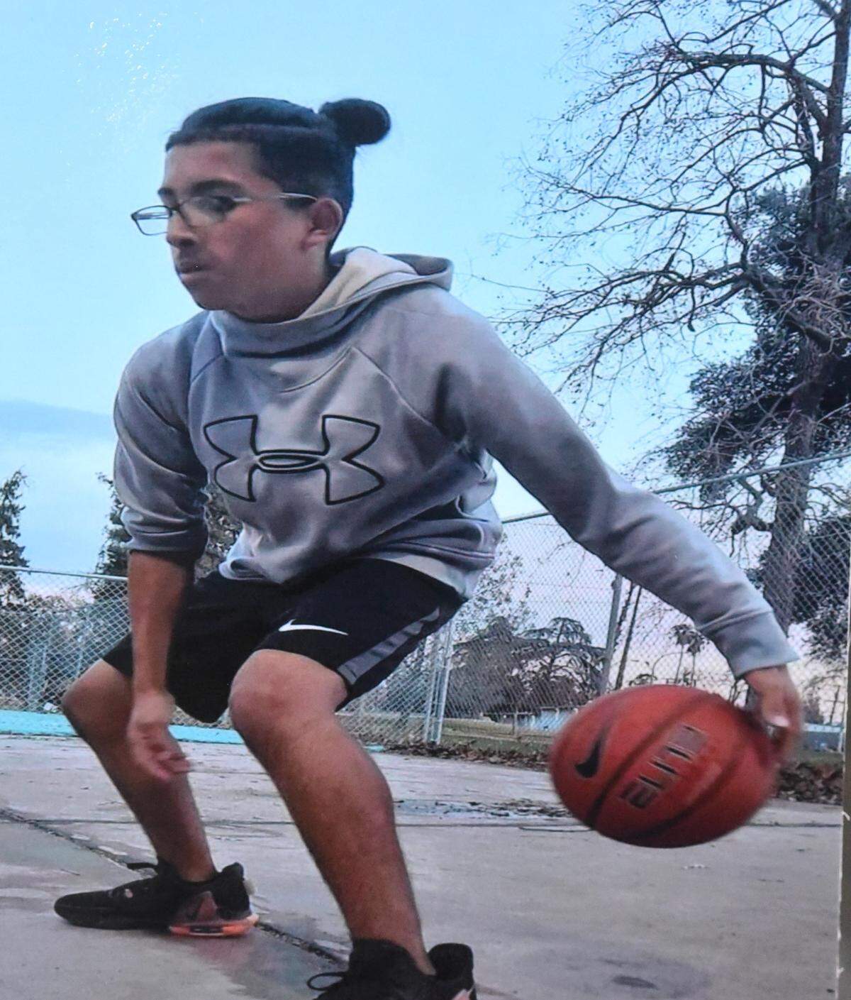 Oscar Xavier Rodriguez, 15, was struck and killed by a vehicle while riding his bike home on July 25, 2024. Family and friends held a candlelight vigil for Rodriguez on Friday, Aug. 2, 2024 at Golden Valley High School in Merced, Calif.