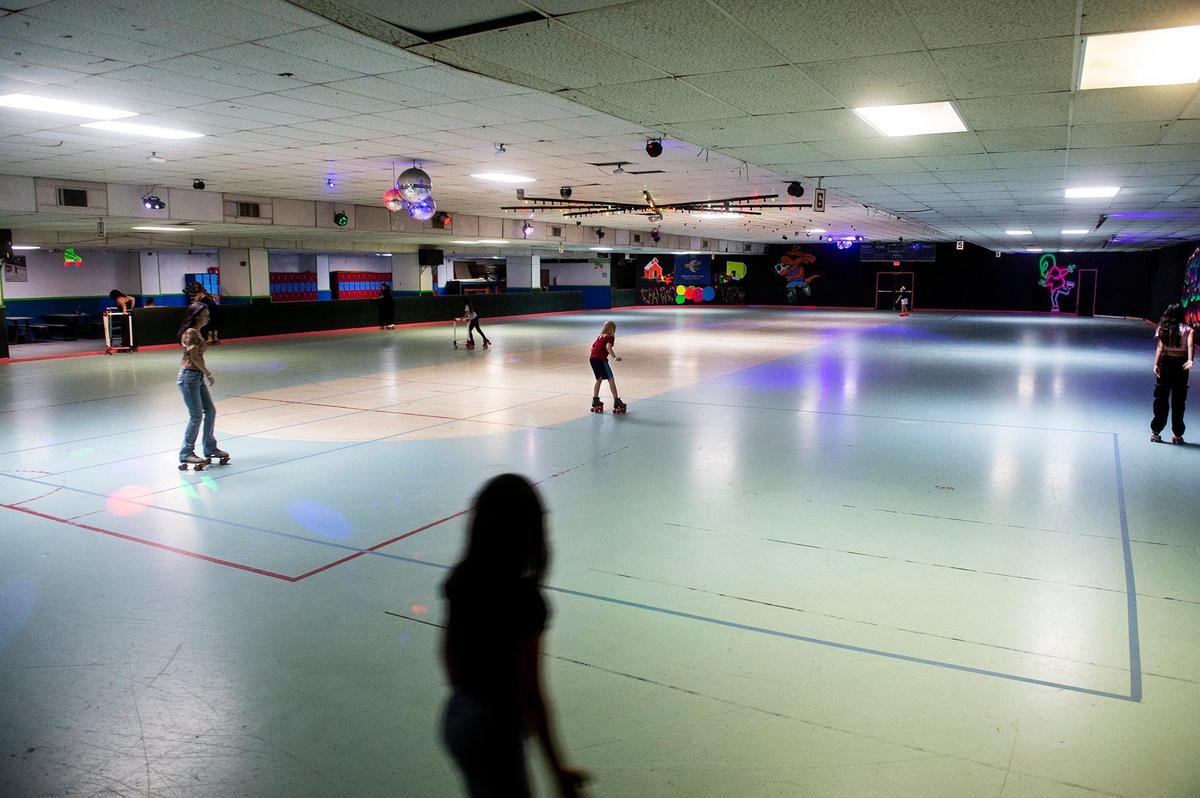 Skaters make their way around the rink at Roll-er Land in Merced, Calif., on Sunday, Oct. 27, 2024
