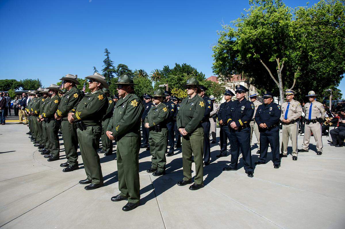 Law enforcement officers from agencies throughout Merced County during the annual Merced County Peace Officers Memorial Ceremony in Merced, Calif., on Wednesday, May 29, 2024. The ceremony honors law enforcement officers who died in the line of duty.
