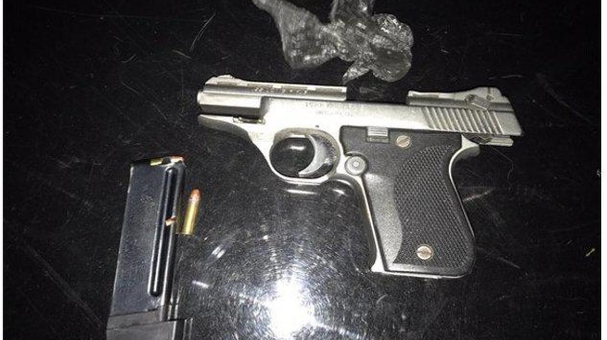 The Merced Police Department said it arrested a suspected gang member in possession of a loaded gun on East 21st Street in Merced on Friday. Photo courtesy of the Merced Police Department.