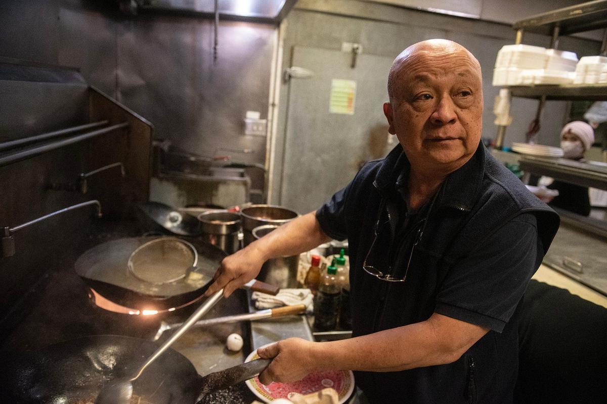 Sam Malaythong, 76, owner of Sam Cafe, demonstrates how he makes pad thai at his restraurant located at 235 W. 12th Street Suite B, in Merced, Calif., on Friday, Jan. 31, 2025.