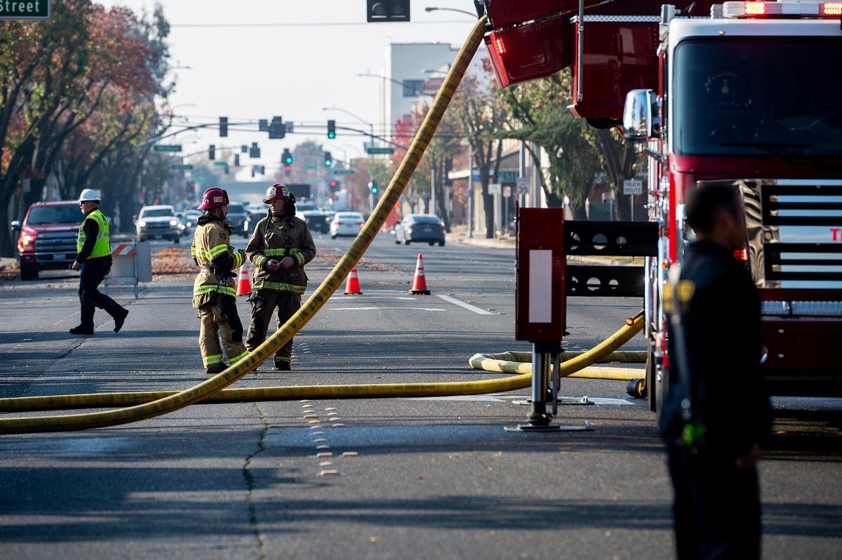 City and county fire crews respond to a structure fire at the historic Merced County High School building located at 2125 M Street in Merced, Calif., on Monday, Dec. 2, 2024. Fire officials said the cause of the fire is under investigation.