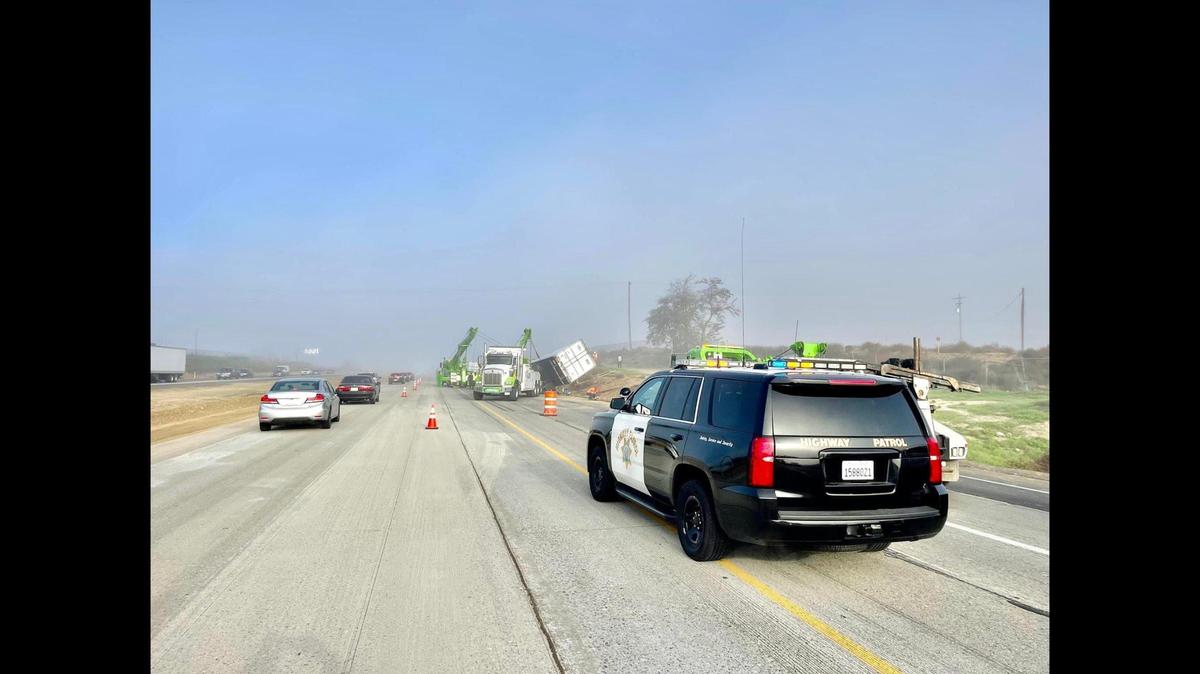 California Highway Patrol officers respond to the scene of an overturned vehicle on northbound Highway 99, south of Collier Road near Livingston, according to authorities. Image courtesy of California Highway Patrol.