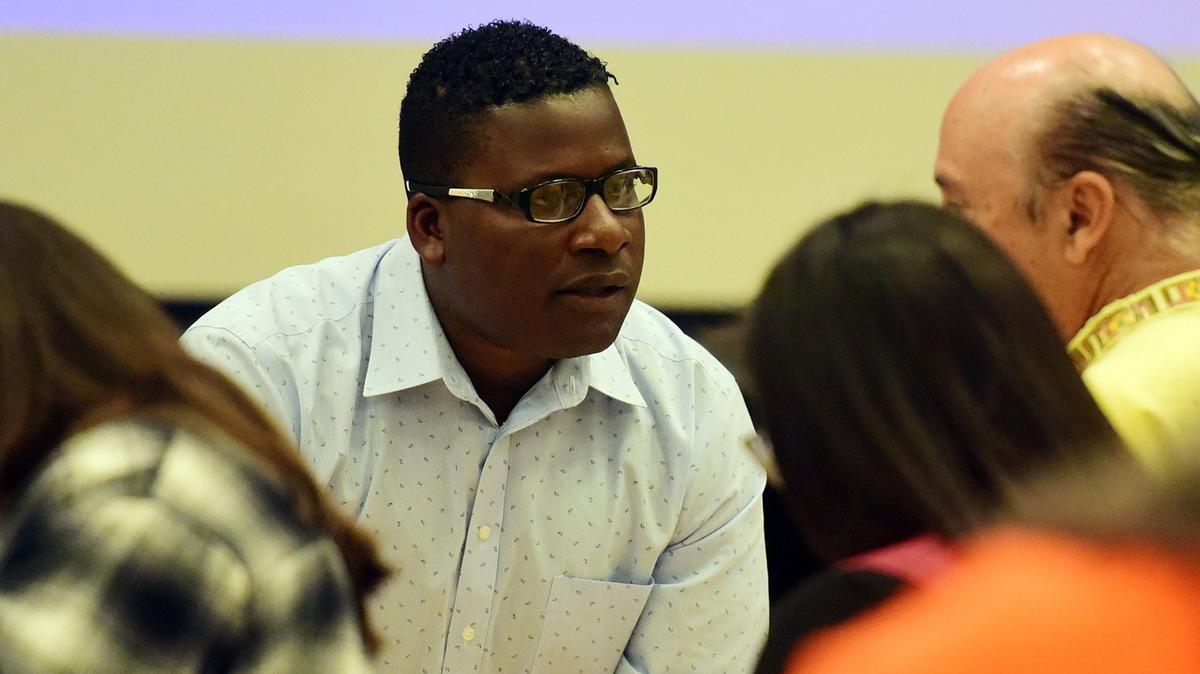 Delray Shelton, a Merced County Sheriff’s sergeant, speaks at a youth-led forum in south Merced on Wednesday, Oct. 17, 2018, where relations with law enforcement was a hot topic.
