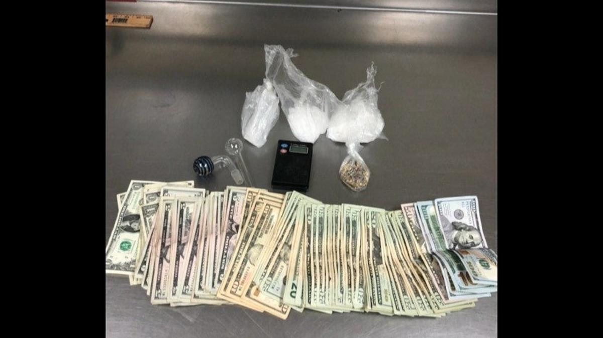 A driver was cited in Merced on Sunday, after a traffic stop led an officer to discover drugs and cash inside the vehicle, according to the Merced Police Department. Police said the driver was also driving on a suspended license. Image courtesy of Merced Police Department.