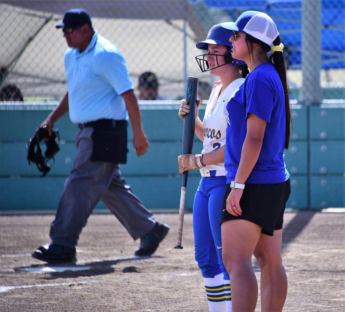 Dos Palos softball coach Irene Barrantes shares a moment with Broncos player Haley Van Worth during the fifth annual Paul Leonardo All-Star Game on Tuesday, June 11, 2019 at the Livingston Softball Complex. 