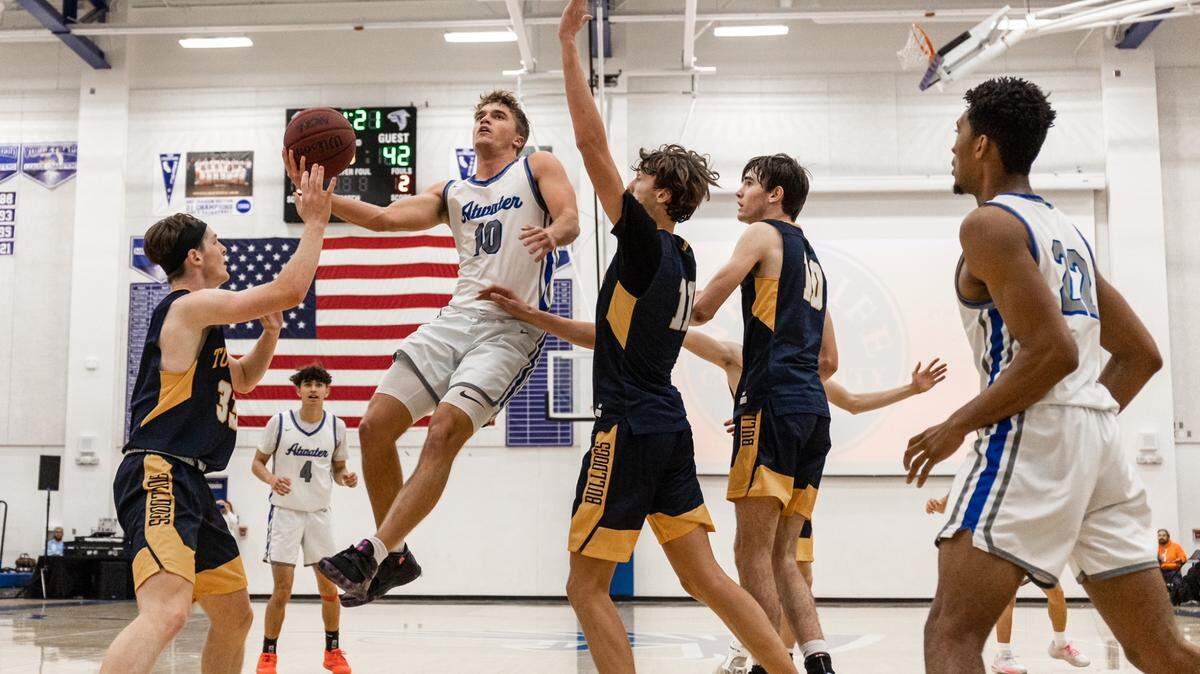 Atwater High senior Tyler Parr (10) is one of four players on the boys basketball team this year that has played at three years of varsity experience.
