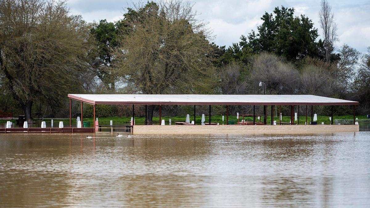 A flooded section of Hagaman Park as the Merced River remains above flood stage in Livingston, Calif., on Sunday, April 2, 2023.
