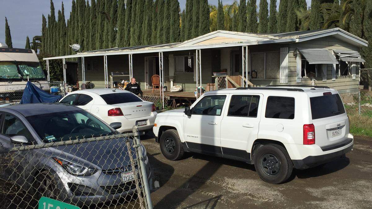 Los Banos police and Merced County Sheriff’s deputies serve warrants at a Los Banos home on Badger Flat Road on Friday, Jan. 18, 2019, in connection with a home invasion that occurred a week prior.