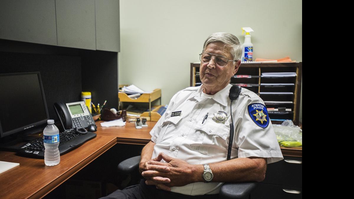 
Mike Raymond, 71, of Atwater speaks in his office at the Atwater Police Department on Thursday. Raymond retired from the Merced County Sheriff’s Department in 1998 and has been serving as a volunteer with the Atwater department since 2006.
