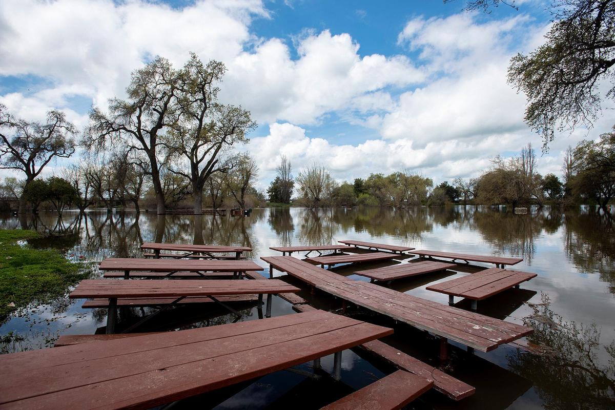 A flooded section of Hagaman Park as the Merced River remains above flood stage in Livingston, Calif., on Sunday, April 2, 2023.