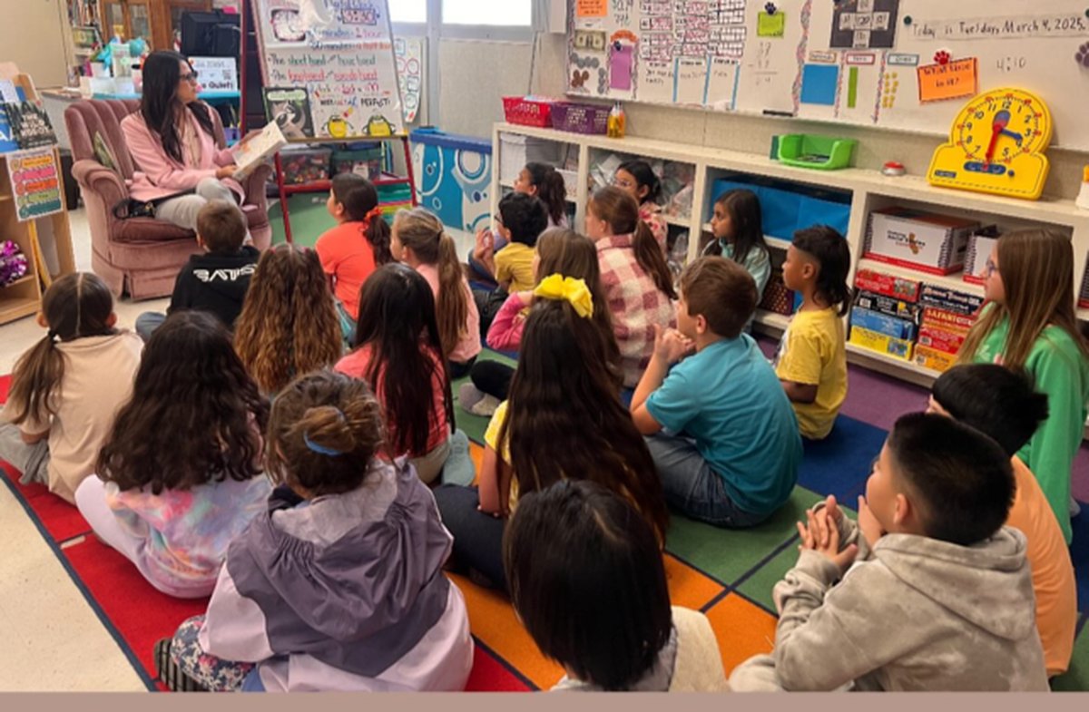 Merced City School District superintendent Julianna Stocking participates in Reading Across America recently at an elementary school.