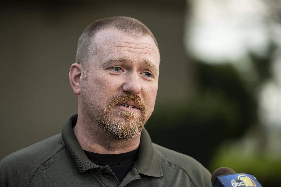 Merced County Sheriffs Deputy and spokesman Daryl Allen, speaks to the media after three children were found dead inside a residence at an apartment complex in Le Grand, Calif., on Wednesday, Jan. 12, 2022. According to authorities, a woman was transported to a hospital with life-threatening injuries.