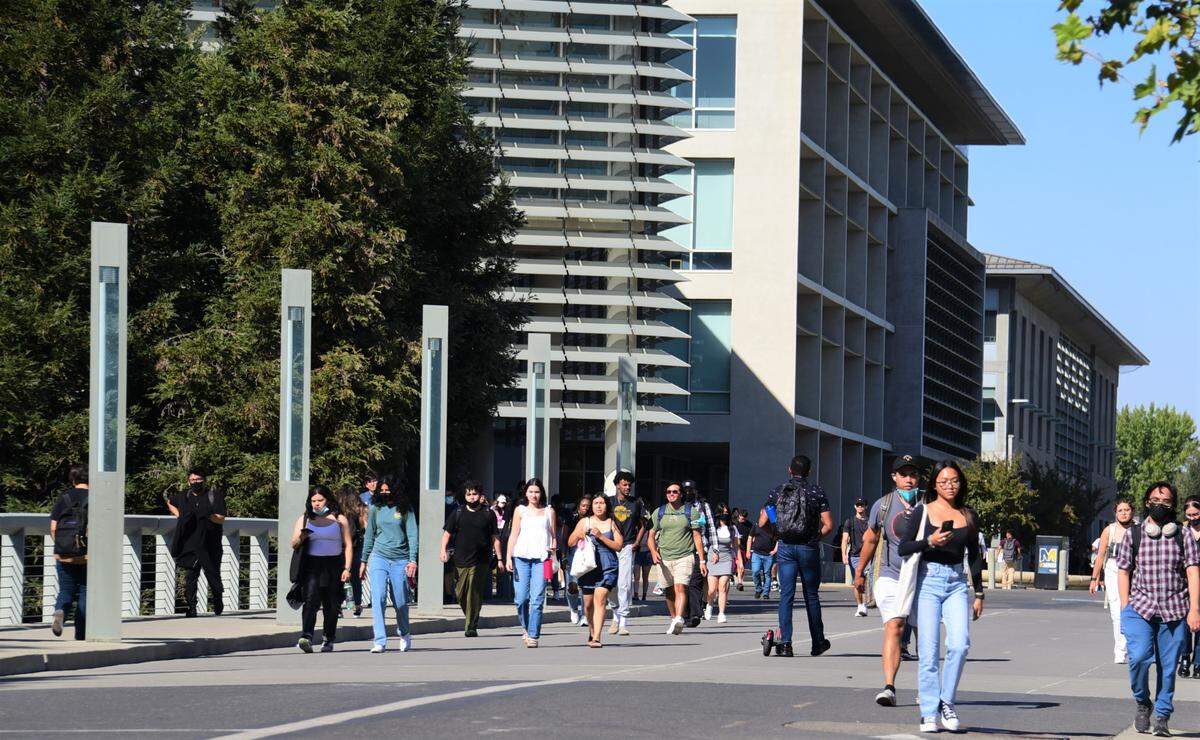 UC Merced students walk across campus on the first day of classes on Wednesday, Aug. 24, 2022 in Merced, Calif.