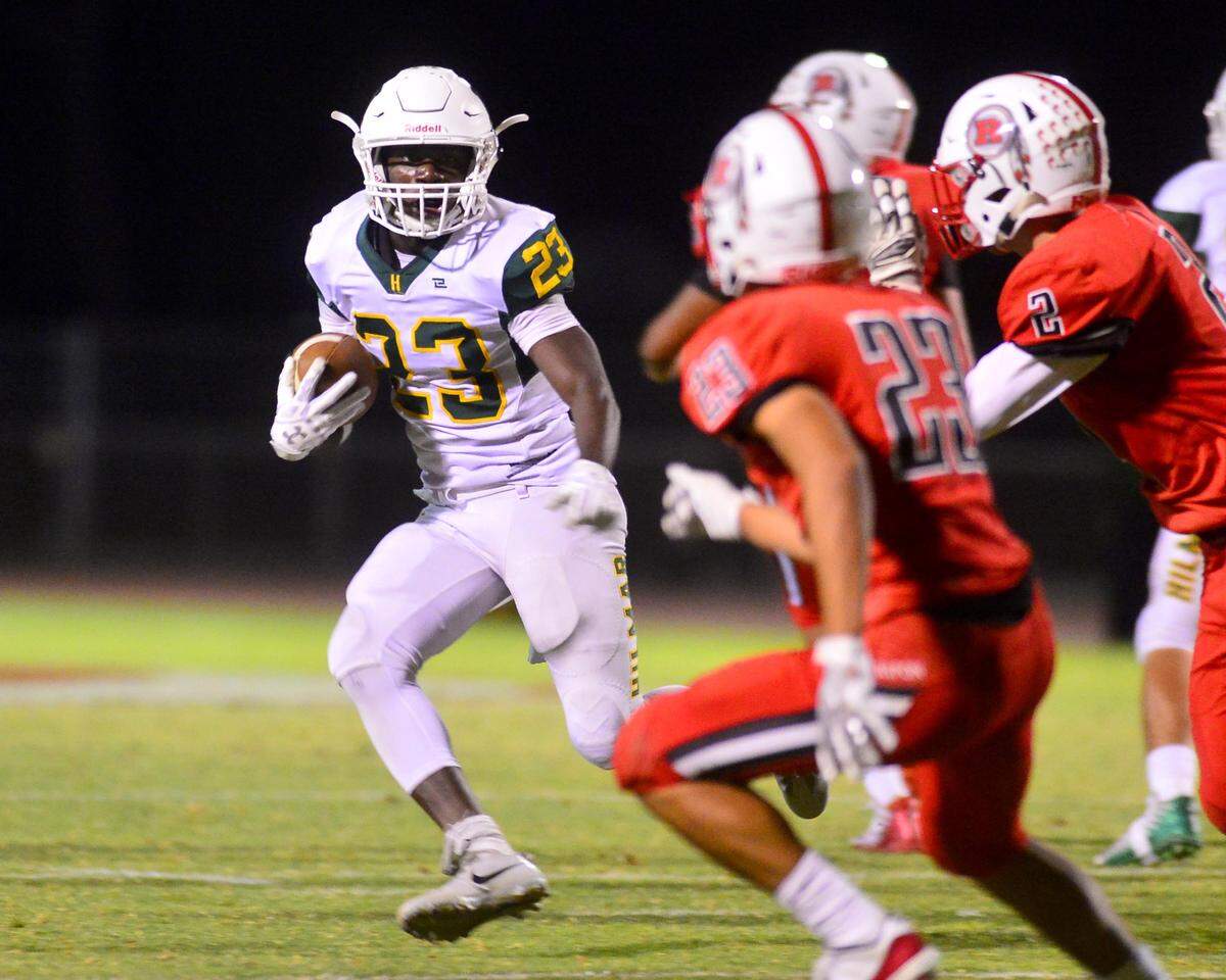 Hilmar running back Issac Sharp runs up field during a game between Ripon and Hilmar at Ripon High School in Ripon CA on September 14, 2018.