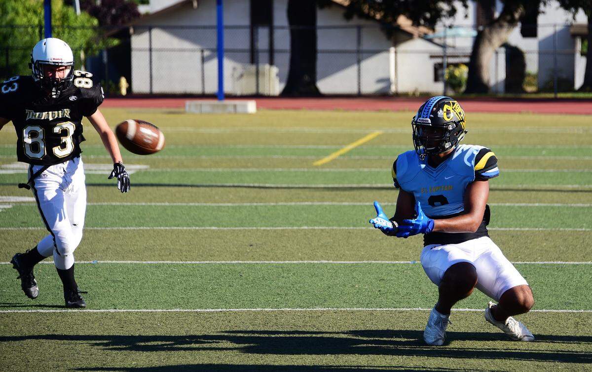 Former El Capitan receiver Ronnie Harris catches a pass during practice for the North/South Rotary Bob Green Football Classic on Tuesday, June 18, 2019 at Atwater High. 