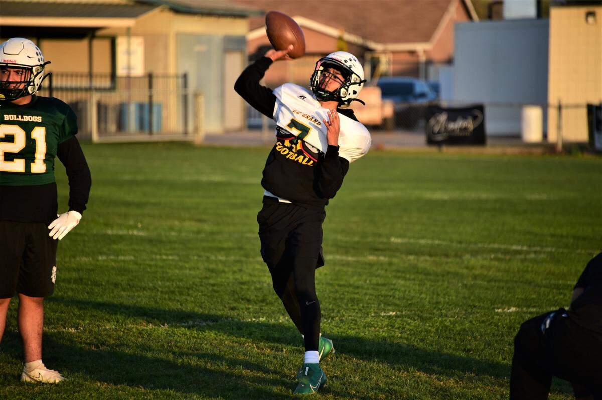Le Grand High junior Julian Bucio throws a pass during practice on Wednesday, Dec. 1, 2021 at Le Grand High School in Le Grand, Calif.